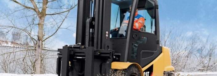 Man works with forklift n heavy snow,OH