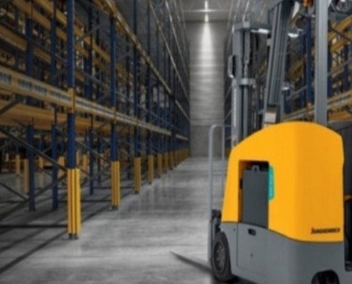 The yellow color forklift in warehouse